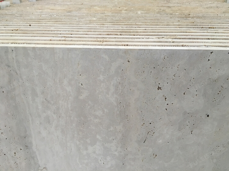 Cut to travertine tile