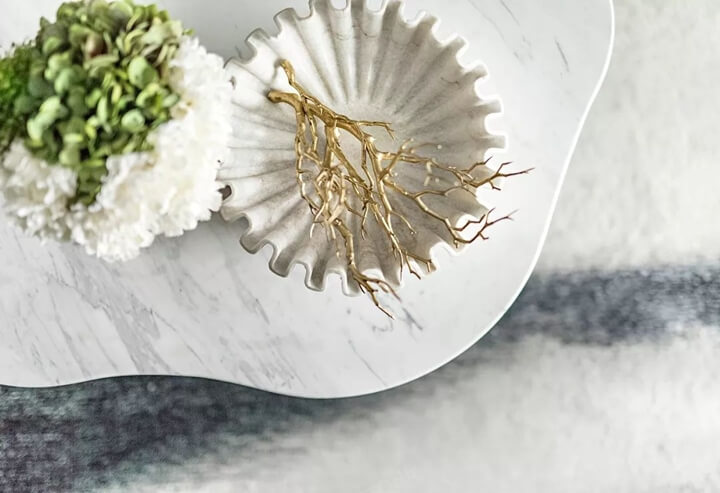 Marble table with metal decor
