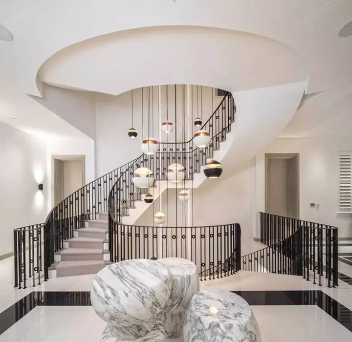 Staircases of metal and marble tile