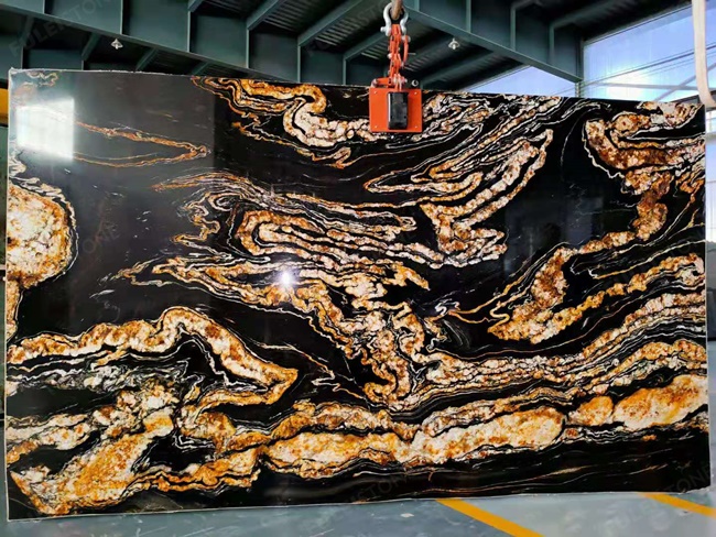 Black magma granite with golden dragon design