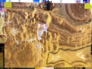 Backlit Bookmatched Orange Onyx Slab for interior decoration