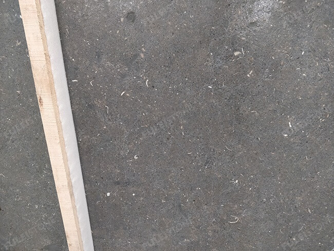 close up of brushed black limestone slabs (2)